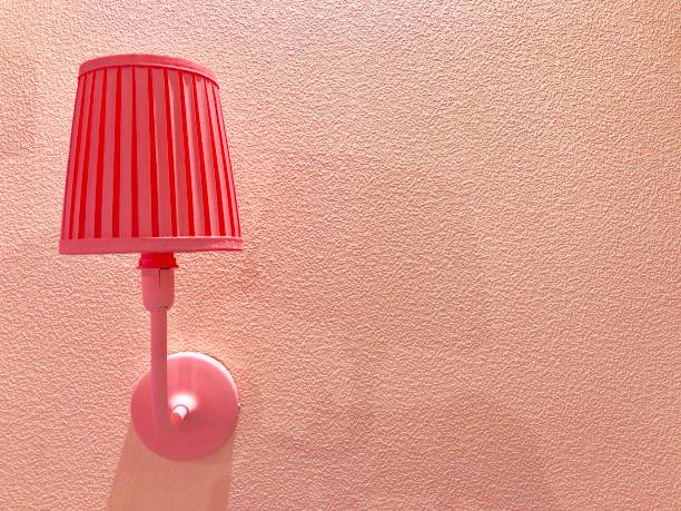 istock Pink stylish lam the wall, Interior design 1169938570