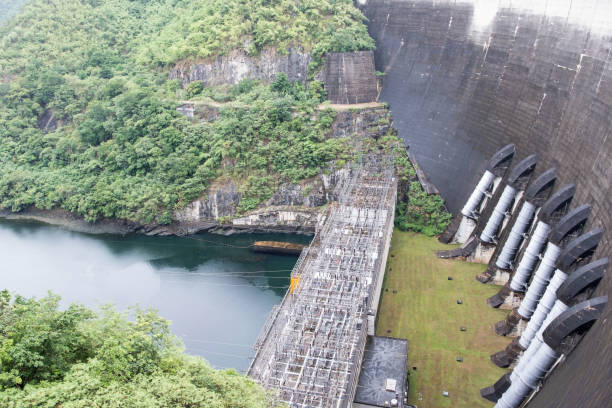 istock Hydroelectric power plant under the large arch concrete dam. 1169942059