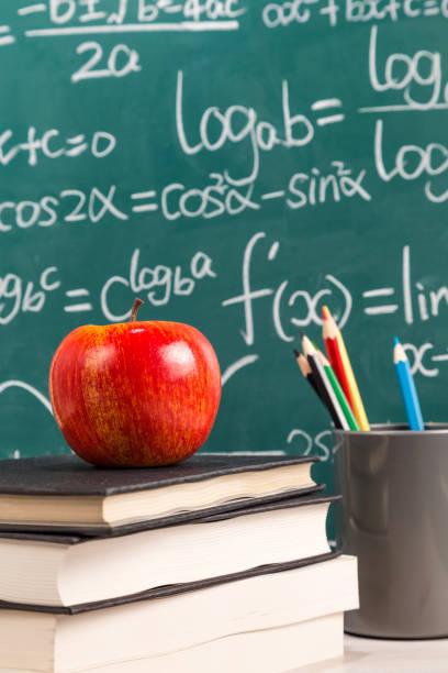 istock The desk in front of the blackboard 1169943041