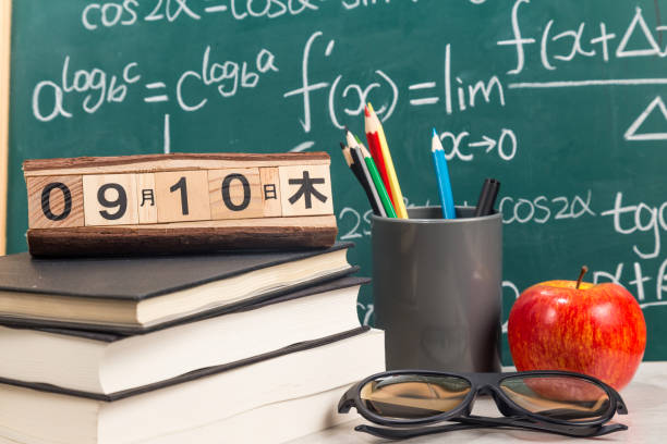 istock The desk in front of the blackboard 1169943048
