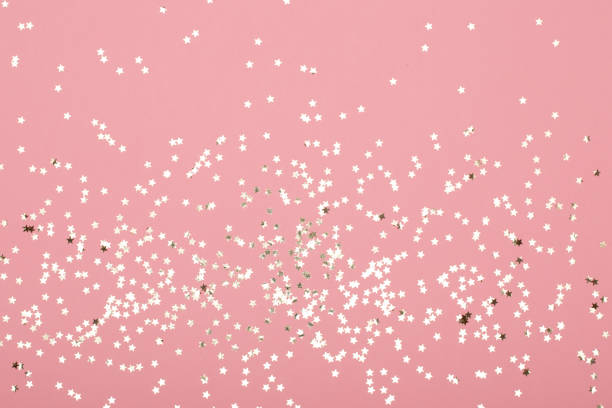 istock Christmas composition. Christmas golden glittering decorations on color background. Flat lay, top view, copy space - Image 1169943110