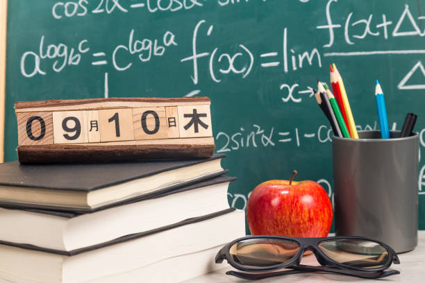 istock The desk in front of the blackboard 1169943117