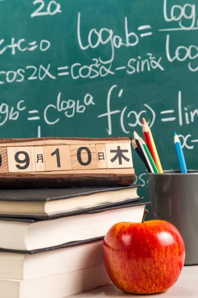 istock The desk in front of the blackboard 1169943124