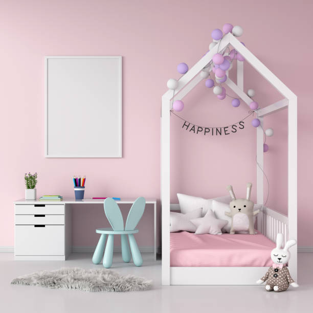 istock Blank photo frame on wall for mockup in child room, 3D rendering 1169943290