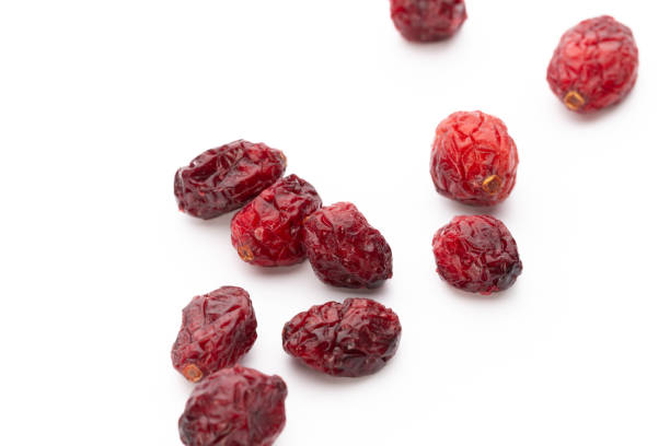 istock Dried cranberries isolated on white background 1169943291