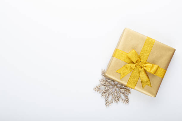 istock Gift or present box and stars confetti on color table top view. Flat lay composition for birthday, mother day or wedding. 1169943372