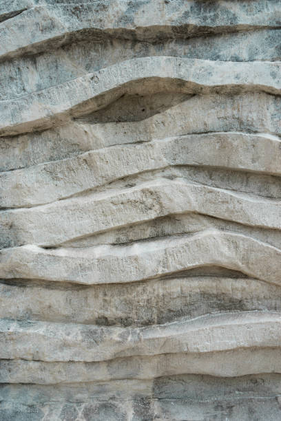 istock Close up beautiful white stone layers of marble background. 1169944317