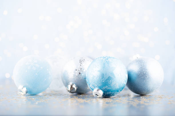 istock Christmas ball background. Greeting card decorations on a blue background. 1169945648
