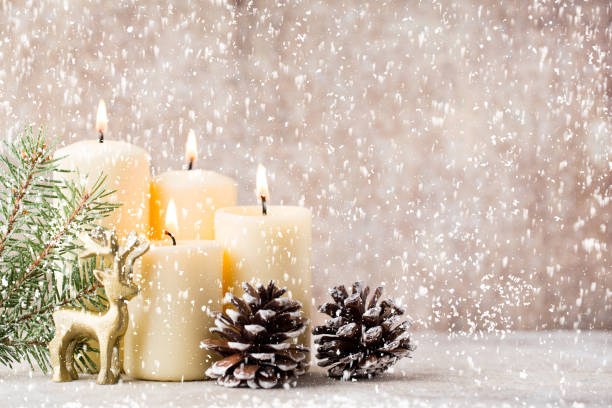 istock Christmas candles and lights. Christmas background. 1169945812