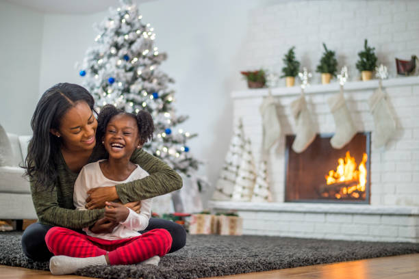 istock Mother and daughter at Christmas 1169953427