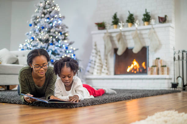 istock Mother and daughter at Christmas 1169953445