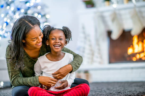 istock Mother and daughter at Christmas 1169953484