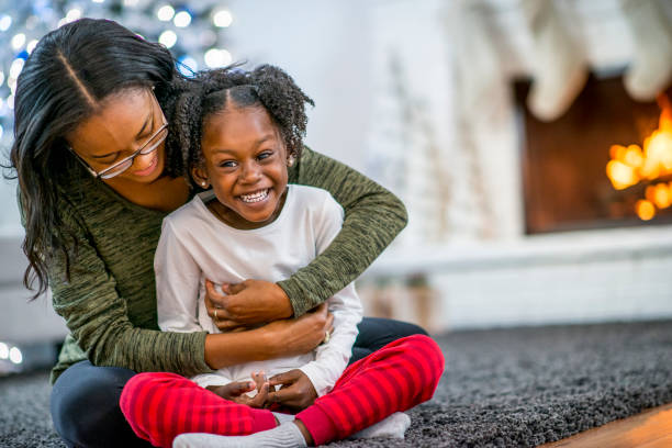 istock Mother and daughter at Christmas 1169953489