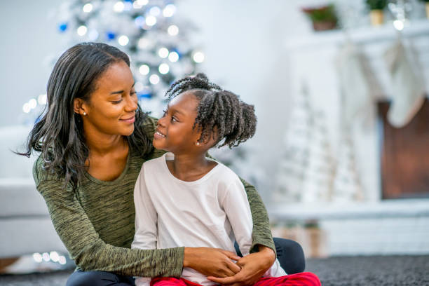 istock Mother and daughter at Christmas 1169953503