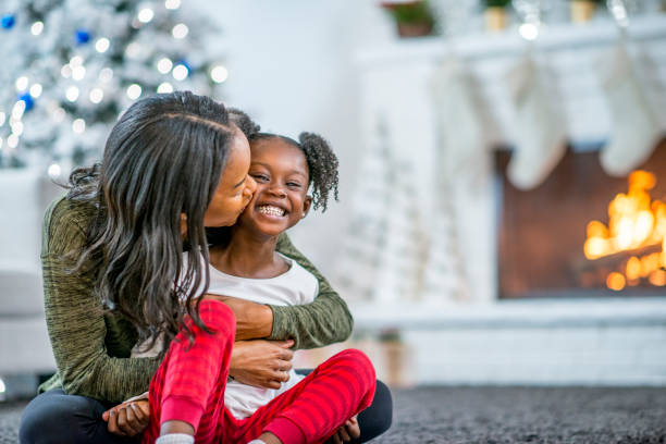 istock Mother and daughter at Christmas 1169953547