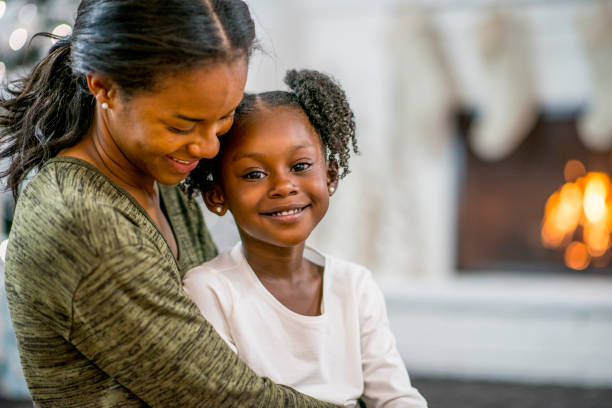 istock Mother and daughter at Christmas 1169953555
