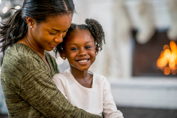 istock Mother and daughter at Christmas 1169953558