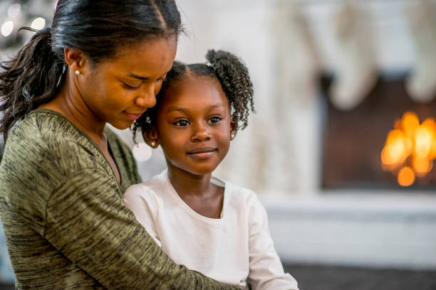 istock Mother and daughter at Christmas 1169953564