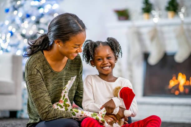istock Mother and daughter at Christmas 1169953580