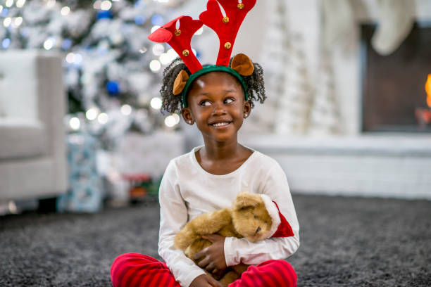 istock Mother and daughter at Christmas 1169954111