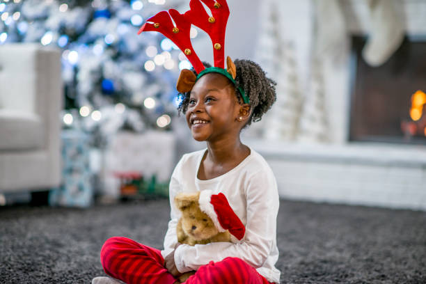 istock Mother and daughter at Christmas 1169954116
