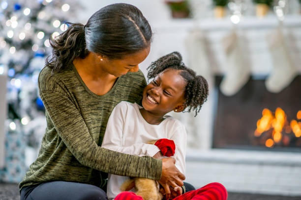 istock Mother and daughter at Christmas 1169954143