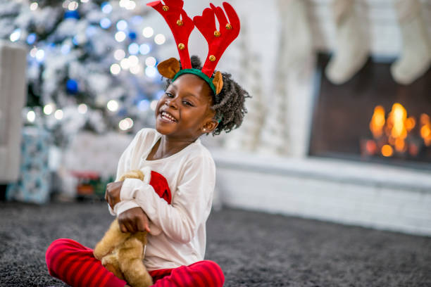 istock Mother and daughter at Christmas 1169954147