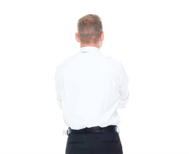 istock Businessman is standing with arms folded 1169954576