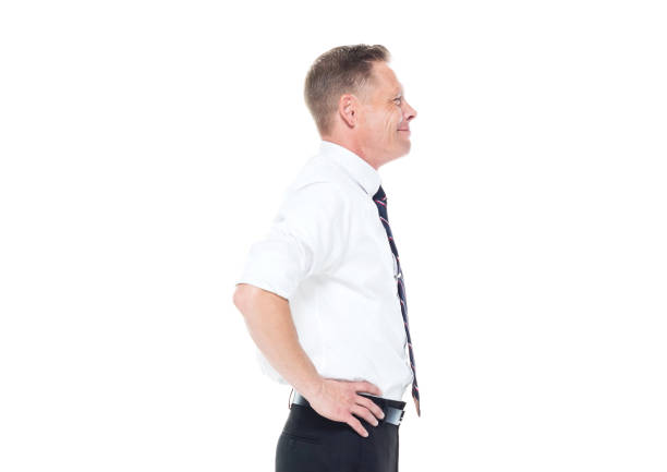 istock Businessman is standing with hands-on hips 1169954588