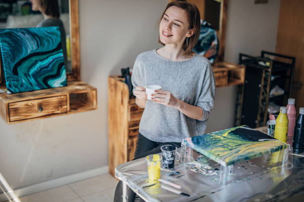 istock Female artist drinking coffee 1169956056