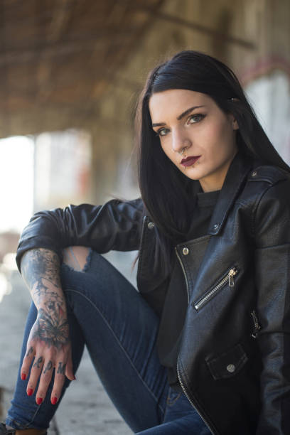 istock Young woman with tattoos 1169958040