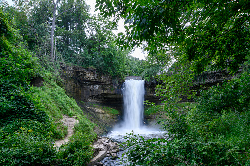 Minnehaha Falls is a 53 foot urban waterfall in large city park in the Twin Cities.\n\nTaken in Minneapolis. Minnesota, USA