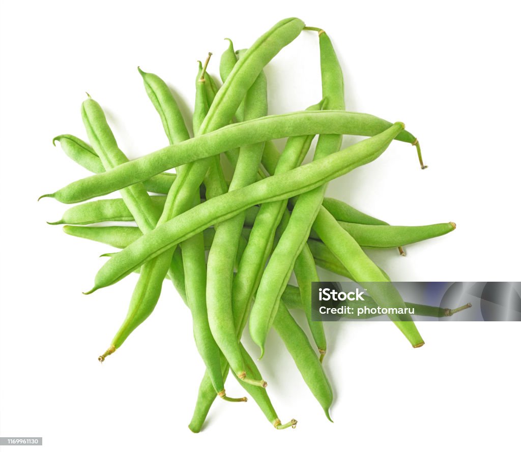 Isolated pile of green beans Isolated beans. Pile of raw green beans (haricot), top view, isolated on white background Green Bean Stock Photo
