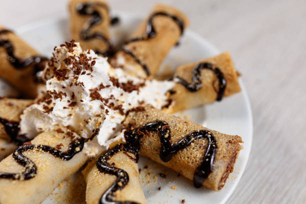 istock Mini crepes with chocolate cream 1169963566