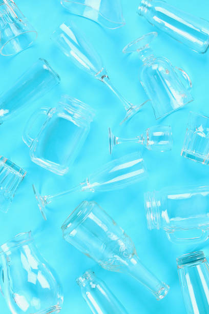 istock Glassware, glasses, jars on pastel blue background. Flat lay, top view. 1169969613
