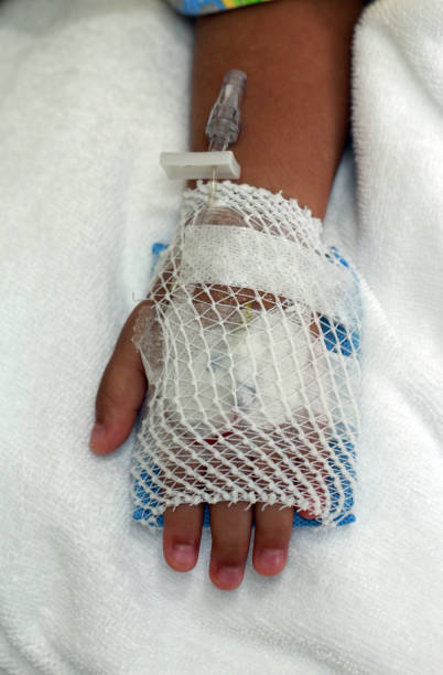 istock Children patient's hand prepare for  iv saline solution in hospital. 1169969835