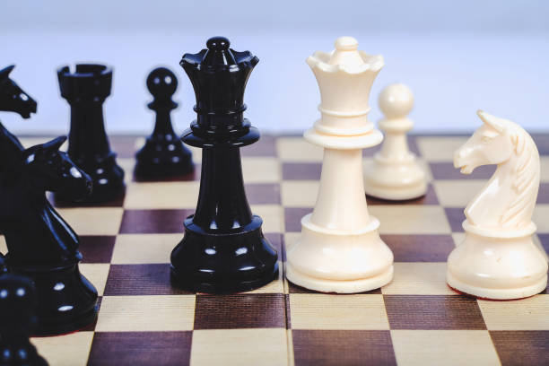 istock chess figure on board game concept for competition and strategy. 1169972191