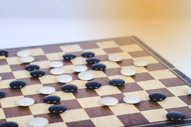 istock Board game Go and black and white bones. Go or wei-Chi ,asian board game. 1169972198