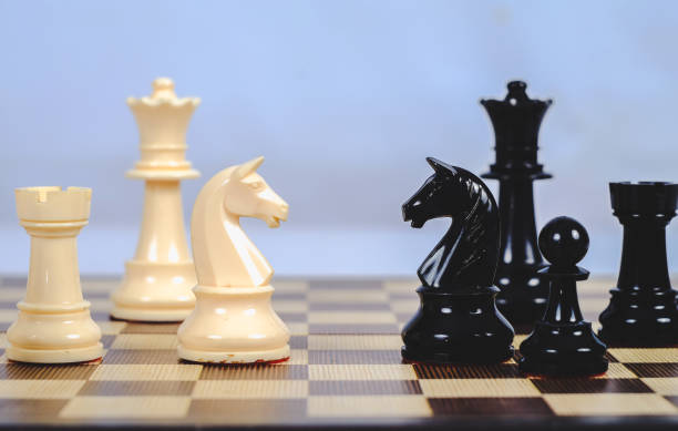 istock chess figure on board game concept for competition and strategy. 1169972202