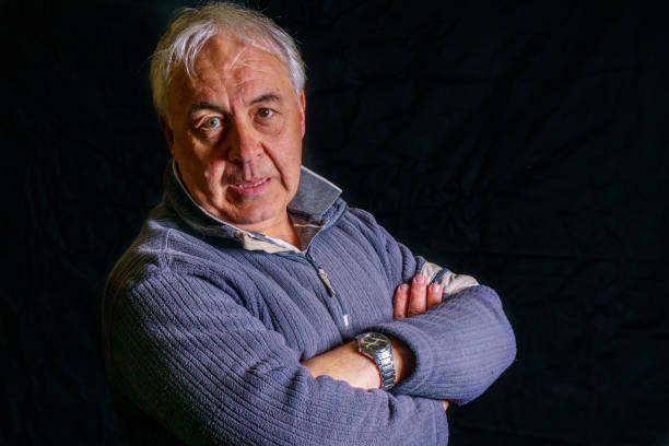istock Mature man grinning portrait close-up 1169972319
