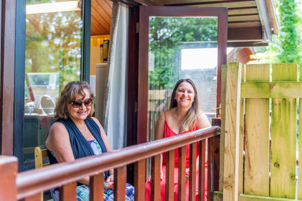 istock Mature and senior women on open balcony 1169972350