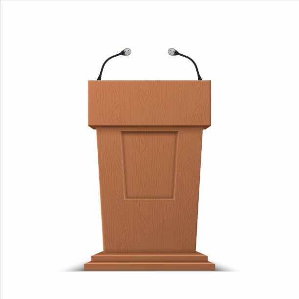 istock Realistic debate stage. 3D conference speech tribune, business presentation stage stand with microphones. Vector isolated illustration 1169973626