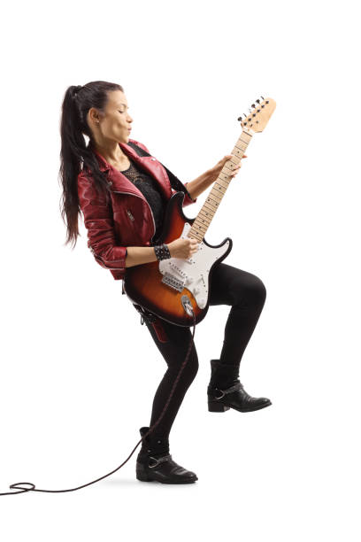 istock Young female rock star with a guitar 1169978070