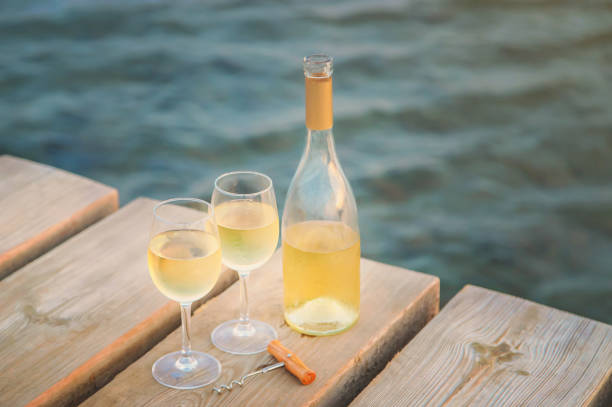 istock Drink wine by the sea. Selective focus. 1169979232
