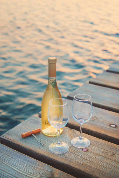 istock Drink wine by the sea. Selective focus. 1169979233
