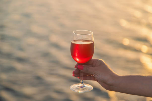 istock Drink wine by the sea. Selective focus. 1169979295