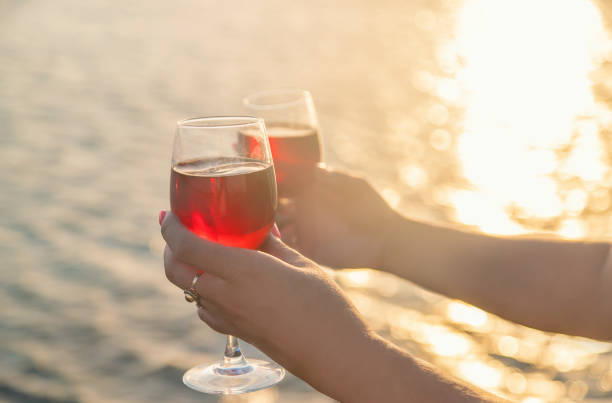 istock Drink wine by the sea. Selective focus. 1169979300