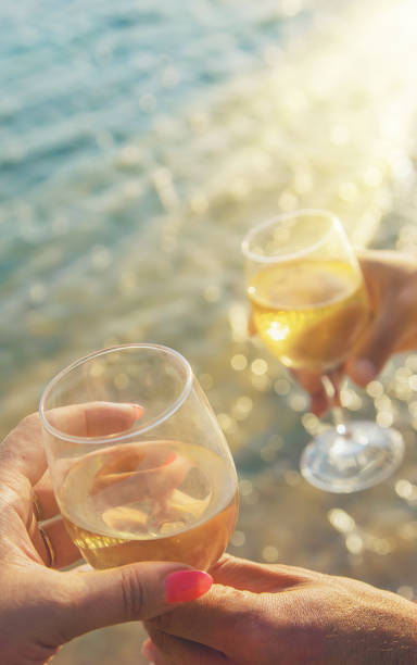 istock Drink wine by the sea. Selective focus. 1169979323