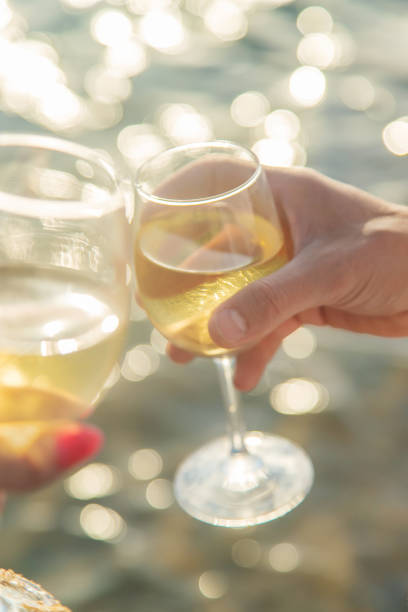 istock Drink wine by the sea. Selective focus. 1169979348