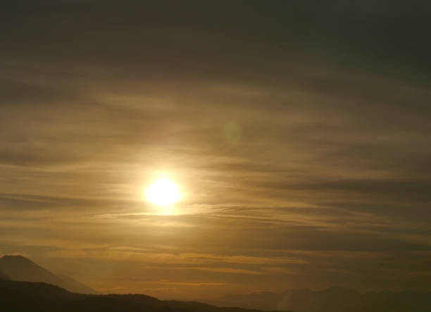 istock beautiful golden sunset sky landscape 1169979395